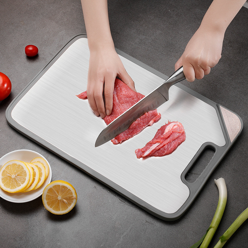 Multi purpose stainless steel cutting board
